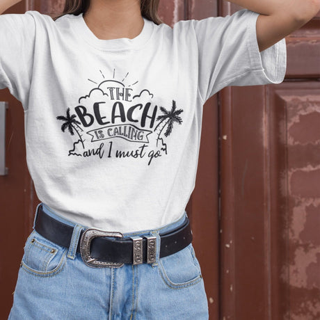 the-beach-is-calling-and-i-must-go-beach-tee-ocean-t-shirt-surfing-tee-outdoors-t-shirt-travel-tee#color_white