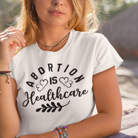 abortion-is-healthcare-abortion-tee-uterus-t-shirt-women-tee-t-shirt-tee#color_white