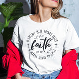 faith-it-doesnt-make-things-easier-it-makes-things-possible-faith-tee-faith-t-shirt-resilience-tee-possibility-t-shirt-hope-tee#color_white