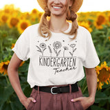 kindergarten-teacher-with-wildflowers-teacher-tee-passionate-t-shirt-creative-tee-nurturing-t-shirt-educator-tee#color_white