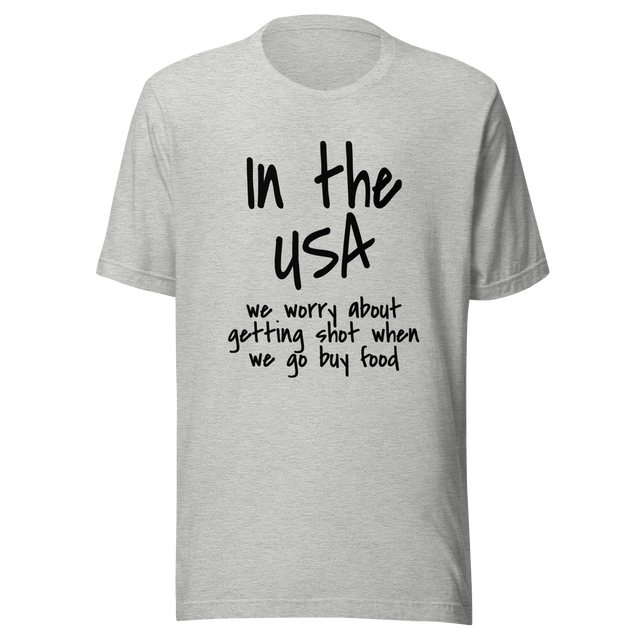 in-the-usa-we-think-about-getting-shot-when-we-go-buy-food-usa-tee-government-t-shirt-shot-tee-t-shirt-tee#color_athletic-heather