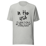 in-the-usa-its-easier-to-buy-a-gun-than-it-is-to-get-a-fishing-license-usa-tee-government-t-shirt-buy-tee-t-shirt-tee#color_athletic-heather