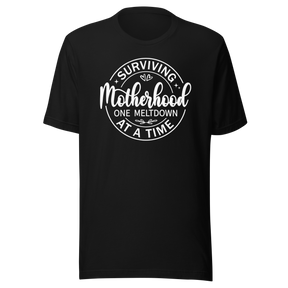 surviving-motherhood-one-meltdown-at-a-time-mom-tee-parents-t-shirt-mom-tee-motherhood-t-shirt-parenting-tee#color_black
