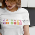 be-kind-with-multi-color-symbols-above-each-letter-be-kind-tee-happy-t-shirt-kindness-tee-gift-t-shirt-simple-tee#color_white