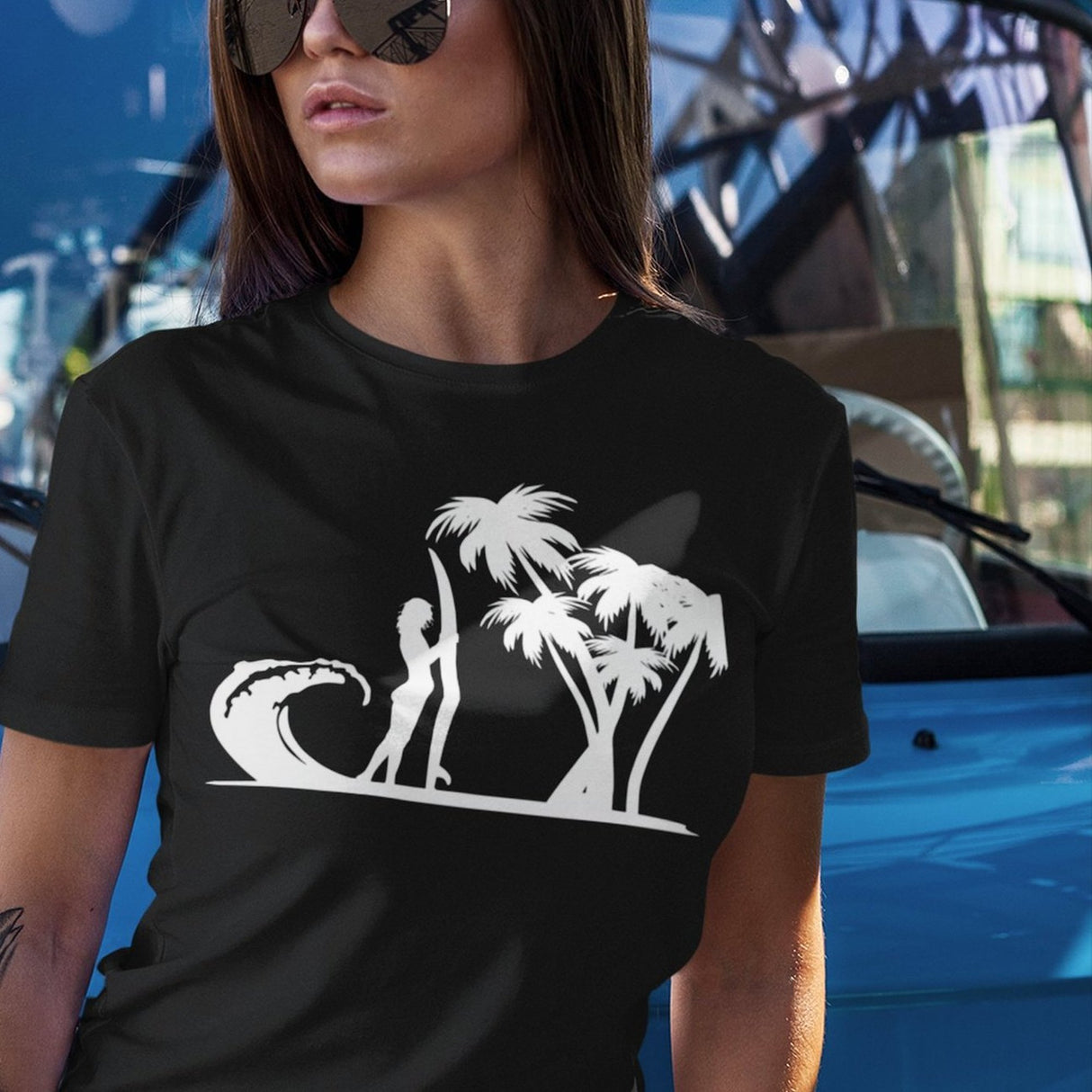 surfer-standing-on-beach-with-wave-and-palm-trees-surf-tee-beach-t-shirt-surfer-tee-beach-t-shirt-surfing-tee#color_black