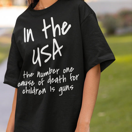 in-the-usa-the-number-one-cause-of-death-for-children-is-guns-usa-tee-government-t-shirt-cause-of-death-tee-t-shirt-tee#color_black